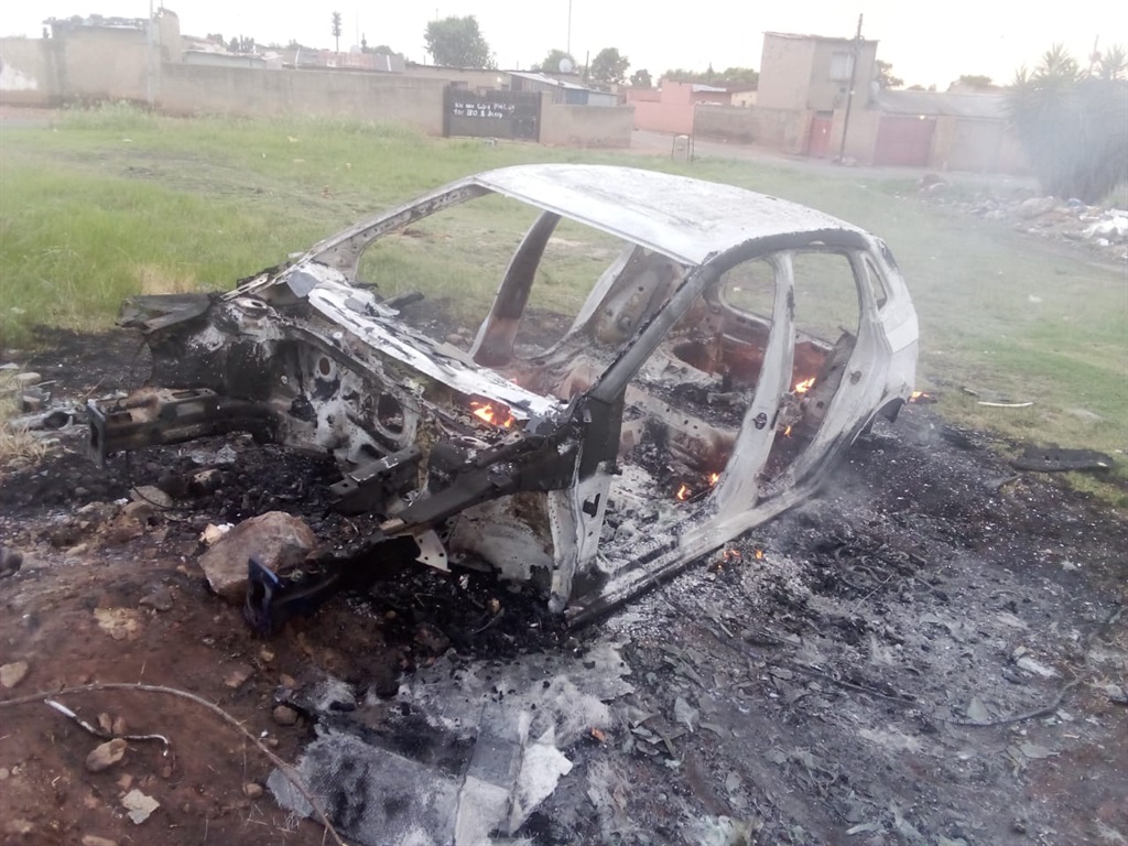 The remains of what kasi residents claim it was a VW Polo. 