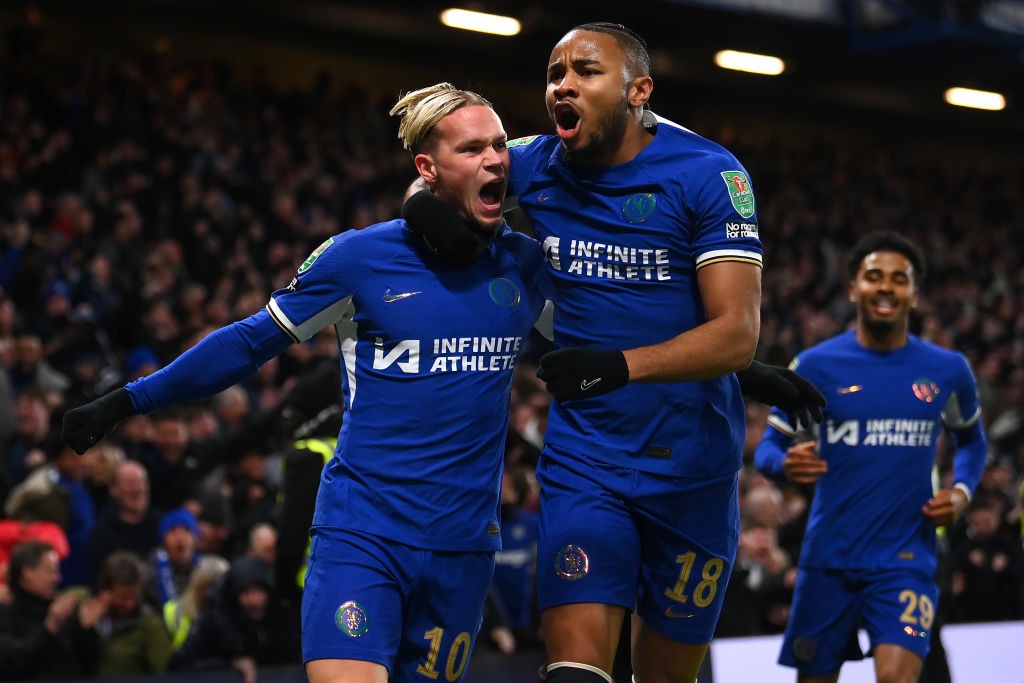 LONDON, ENGLAND - DECEMBER 19: Mykhaylo Mudryk of Chelsea celebrates with team mate Christopher Nkunku after scoring their sides first goal during the Carabao Cup Quarter Final match between Chelsea and Newcastle United at Stamford Bridge on December 19, 2023 in London, England. (Photo by Mike Hewitt/Getty Images)
