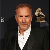 Romancing the stone! Newly-divorced Kevin Costner cosies up to Jewel