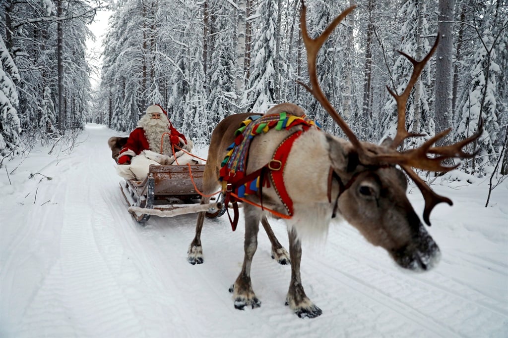 Santa Claus rides in his sleigh as he prepares for Christmas in the Arctic Circle in Rovaniemi, Finland. (PHOTO:  GALLO IMAGES/ REUTERS)