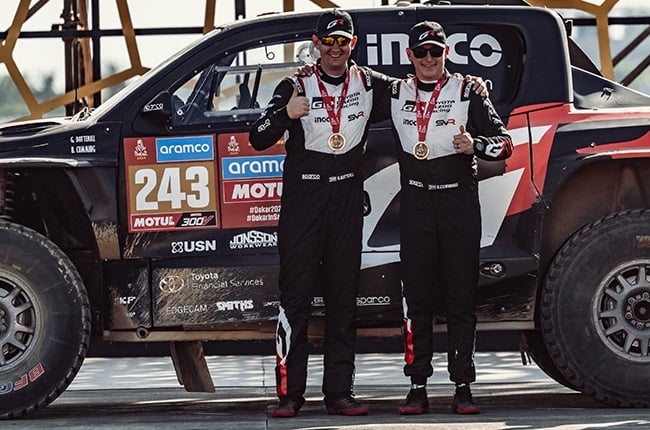 Guy Botterill (left) and Brett Cummings at the end of the 2024 Dakar Rally. (Toyota Gazoo Racing South Africa / Twitter)