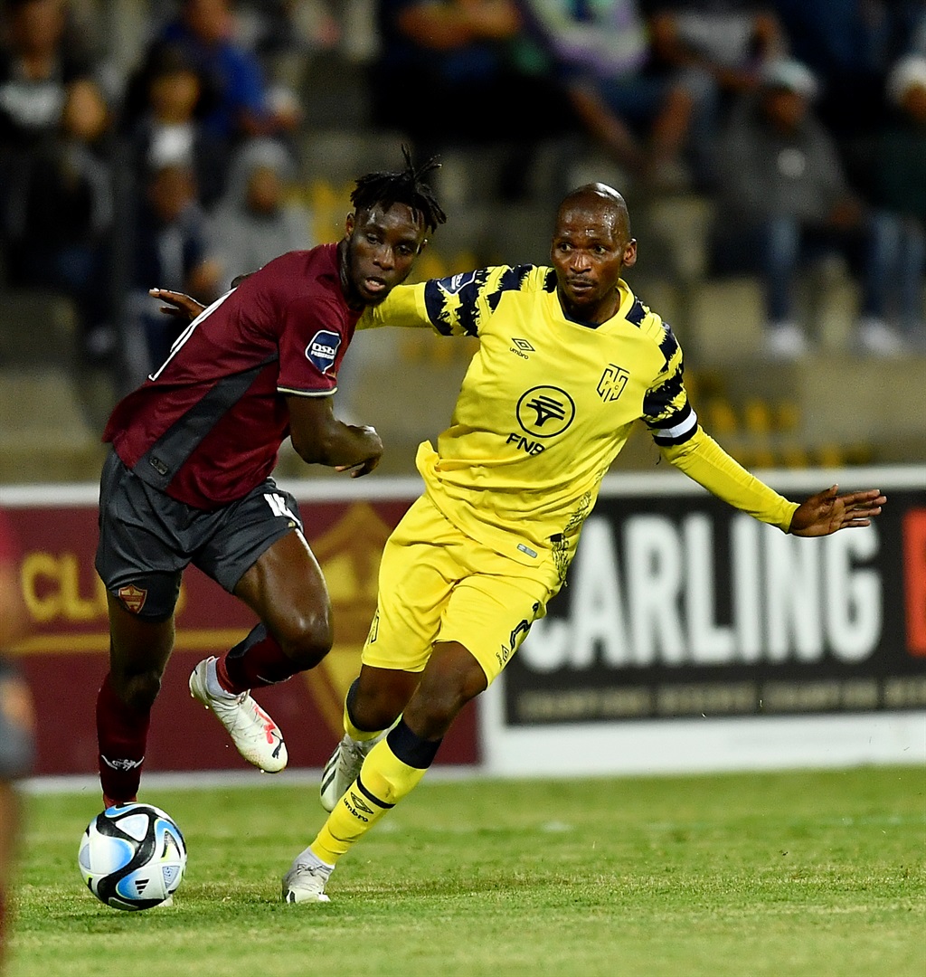STELLENBOSCH, SOUTH AFRICA - DECEMBER 08: Thamsanqa Mkhize of Cape Town City and Anicet Oura of Stellenbosch FC during the DStv Premiership match between Stellenbosch FC and Cape Town City FC at Danie Craven Stadium on December 08, 2023 in Stellenbosch, South Africa. (Photo by Ashley Vlotman/Gallo Images)