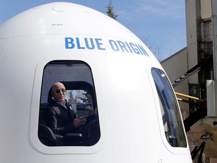 Amazon and Blue Origin founder Jeff Bezos addresses the media about the New Shepard rocket booster and Crew Capsule mockup at the 33rd Space Symposium in Colorado Springs, Colorado, United States April 5, 2017.
