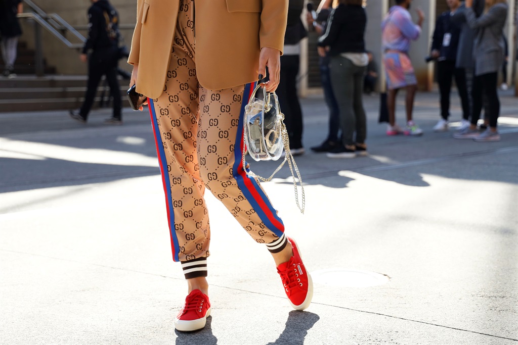 A guest wearing Gucci pants and Stuad bag at Mercedes-Benz Fashion Week Resort 20 Collections on May 15, 2019 in Sydney, Australia. (Photo by Hanna Lassen/WireImage/Getty Images)