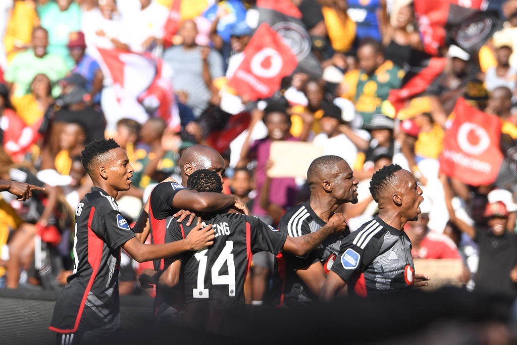 Monnapule Saleng of Orlando Pirates celebrates his goal with teammates during the DStv Premiership match between Orlando Pirates and Kaizer Chiefs at FNB Stadium on March 09, 2024, in Johannesburg, South Africa.  