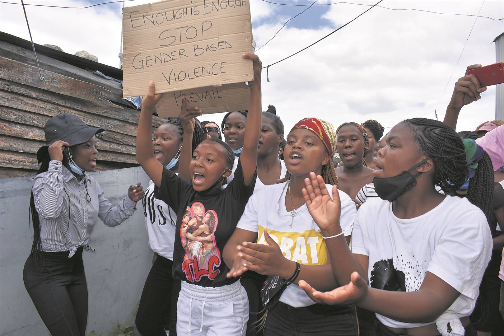 Sibonokuhle Ndesana’s friends marched to a shack where she was found dead.  Photo By Buziwe Nocuze