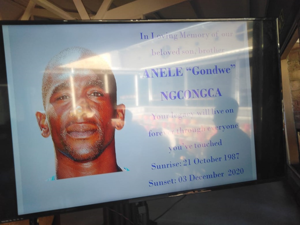 Pictures of Anele on the projector ahead of his memorial service. Photo by Misheck Makora