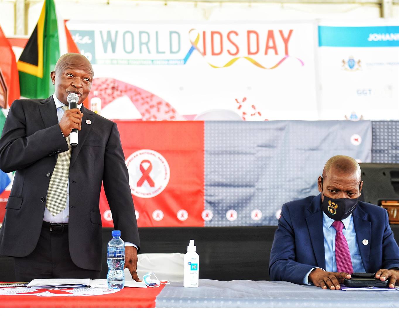 An emotional Deputy President David Mabuza (left) pledges to adopt an HIV-positive girl.     Photo by Christopher Moagi 