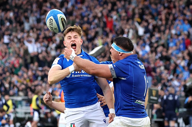 Stephen Varney of Italy celebrates scoring his team's third try with teammate Danilo Fischetti during the Six Nations match between Italy and Scotland at Stadio Olimpico in Rome. (Giampiero Sposito/Getty Images),Ø