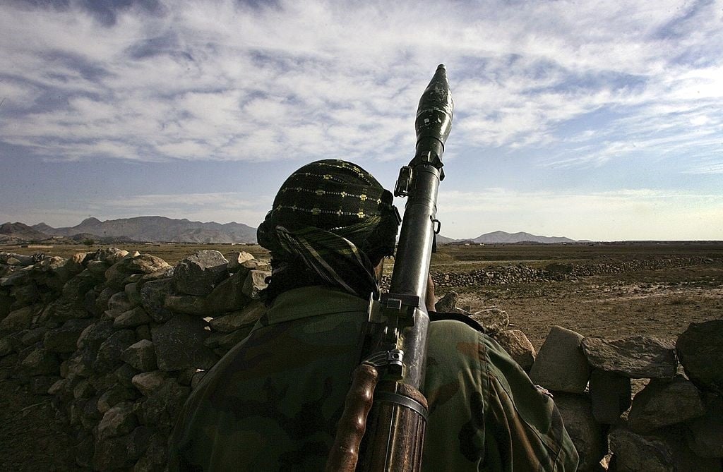 An Afghan National Army soldier looks towards the Pakistani border.
