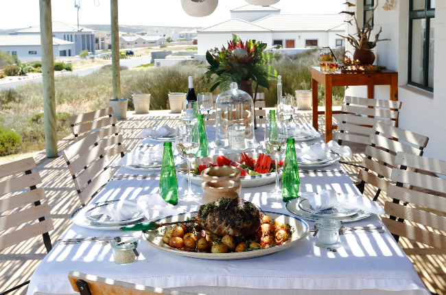 This photo is from a YOU celebration shoot shows just how elegant keeping food and décor to a minimum can be when you’re hosting family or friends at home.  (Photo: Jacques Stander)