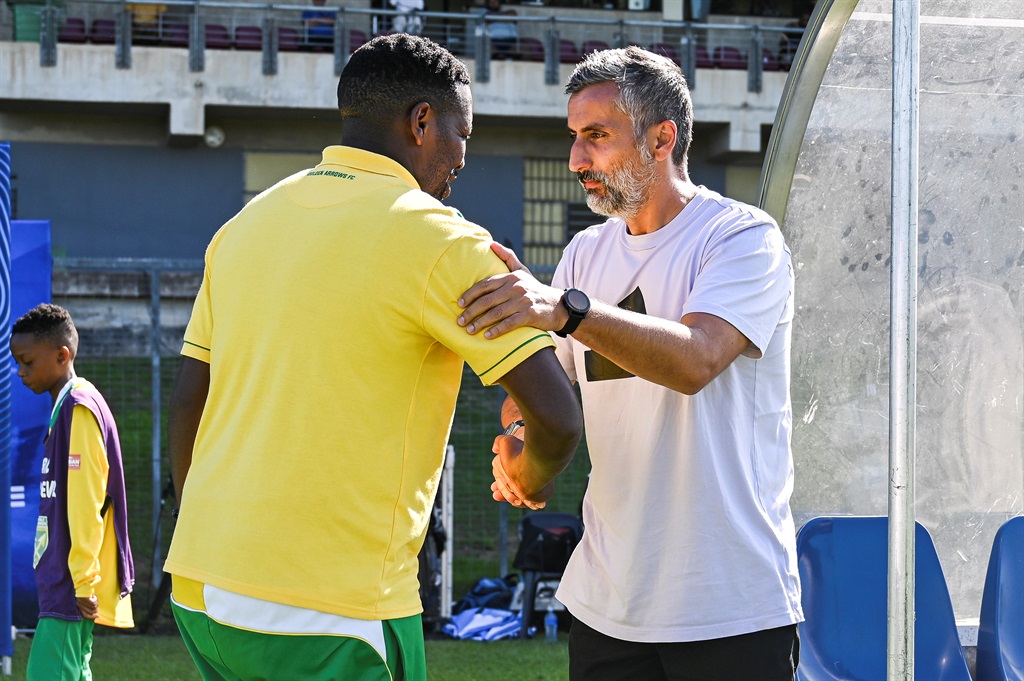 HAMMERSDALE, SOUTH AFRICA - DECEMBER 17: Mabhuti Khenyeza, coach of Golden Arrows FC greets Jose Riveiro, head coach of Orlando Pirates during the DStv Premiership match between Golden Arrows and Orlando Pirates at Mpumalanga Stadium on December 17, 2023 in Hammersdale, South Africa. (Photo by Darren Stewart/Gallo Images),?¤+¬?!