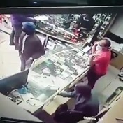 WATCH | Robbers buy R20 airtime before ransacking cellphone shop in Johannesburg