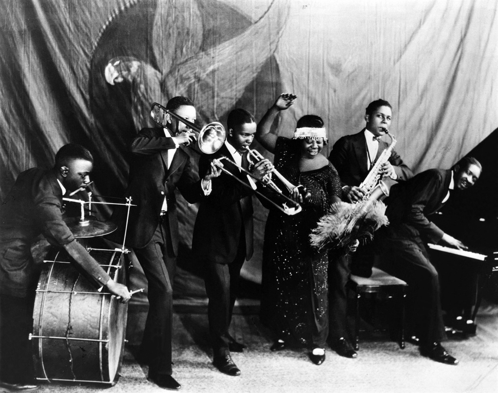 Ma Rainey Georgia Jazz Band pose for a studio group shot c 1924-25 with 'Gabriel', Albert Wynn, Dave Nelson, Ma Rainey, Ed Pollack and Thomas A Dorsey. (Photo by JP Jazz Archive/Redferns)

