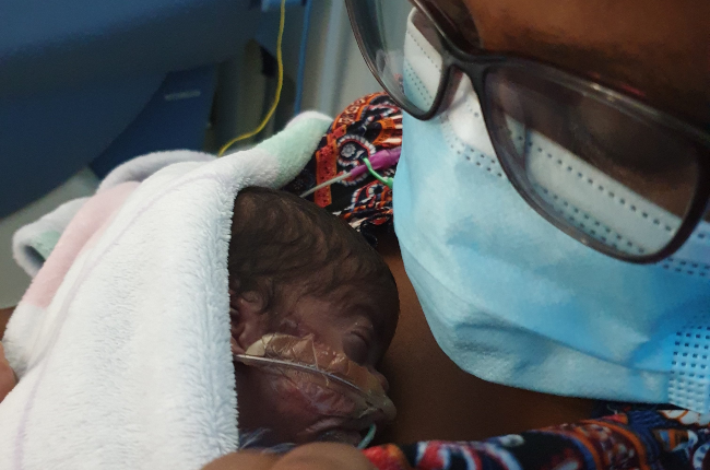 United at last. Nosipho Nkantini holds her tiny baby boy, Oyena, for the first time weeks after he was born prematurely.
