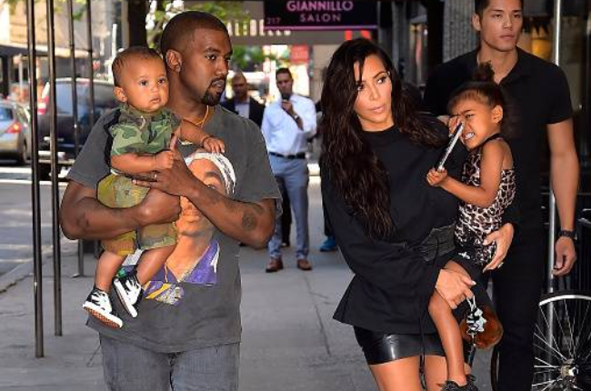Kim Kardashian West and Kanye West with two of their four children, North and Saint West. 