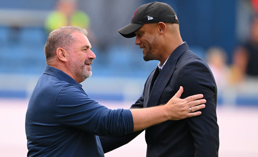 BURNLEY, ENGLAND - SEPTEMBER 02: Spurs head coach Ange Postecoglou greets Vincent Kompany prior to the Premier League match between Burnley FC and Tottenham Hotspur at Turf Moor on September 02, 2023 in Burnley, England. (Photo by Stu Forster/Getty Images)