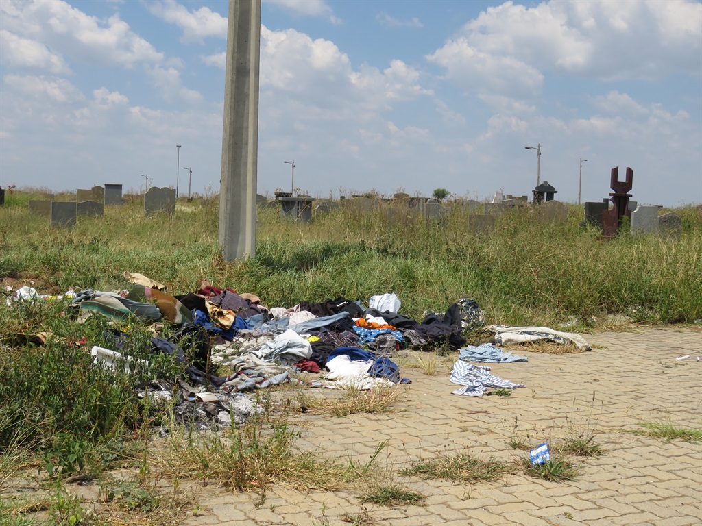 Cemetery is also a dumping site. Photo by Khaya Ma