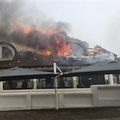  Shock as luxury hotel goes up in flames  