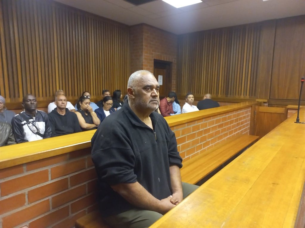 News24 | Gqeberha man accused of murdering property agent wife blows kiss to children in court
