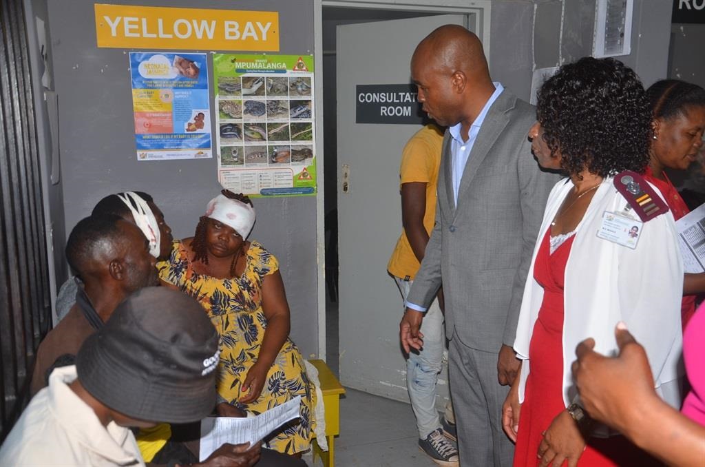 MEC Mandla Ndlovu (wearing a grey suit) visiting some of the injured youth at Tintswalo Hospital in Acornhoek.
Photo by Oris Mnisi