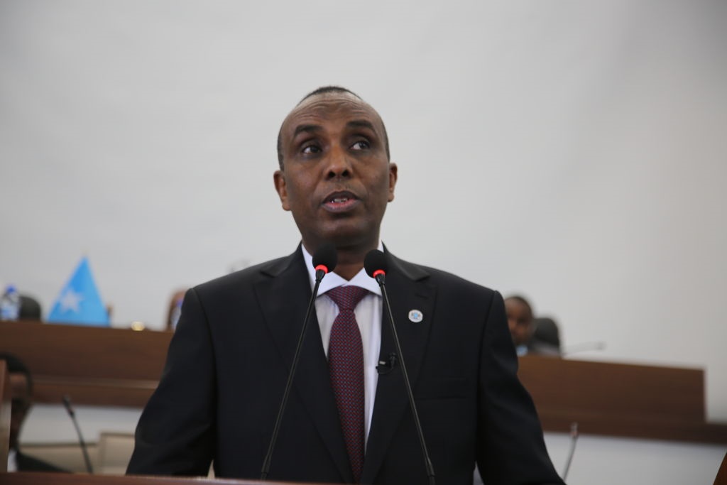 Hamza Abdi Barre assuming office as Somalia's 21st prime minister after receiving a vote of confidence from all the 220 members of parliament in Somalia on June 25.