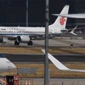 China orders five airlines to halt some flights on virus cases