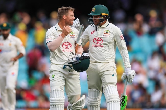 David Warner and Usman Khawaja leave the field after day one of the third Test in the series between Australia and Pakistan at Sydney Cricket Ground. (Photo by Mark Evans/Getty Images)