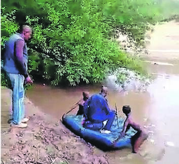 Many illegal immigrants are using old bed mattresses with tubeless tyres to cross Caledon River, between Ficksburg and Lesotho, into South Africa.