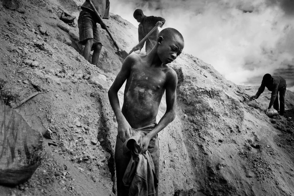 A young boy works among about 4,000 artisan miners