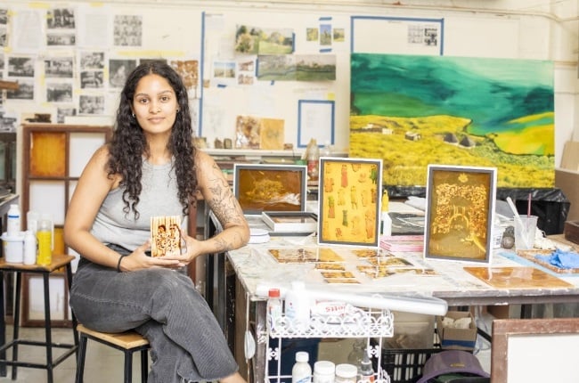 Zenaéca Singh at her studio in Cape Town surrounded by some of the art pieces she'll be showcasing at an art fair. (PHOTO: ER Lombard)