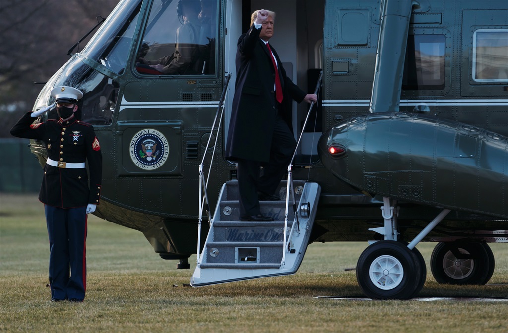 President Donald Trump and first lady Melania Trump board Marine One as they depart the White House on January 20, 2021 in Washington, DC. (Photo by Eric Thayer/Getty Images)