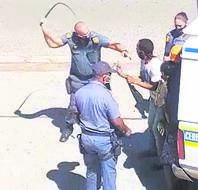 Police caught on camera assaulting two men on Monday this week. 