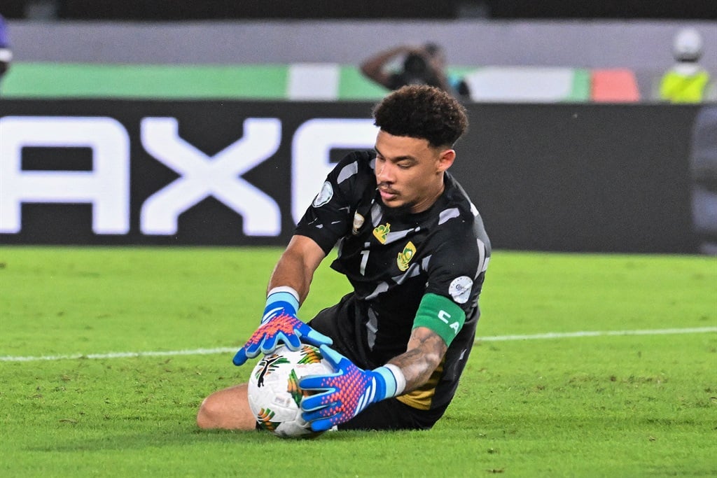 Bafana Bafana goalkeeper #1 Ronwen Williams makes a save during the Africa Cup of Nations (CAN) 2024 third place play-off football match between South Africa and Democratic Republic of Congo at Felix Houphouet-Boigny Stadium in Abidjan on 10 February 2024. 