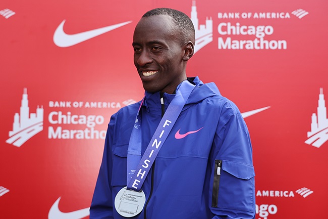 Kenya's Kelvin Kiptum looks on after winning the 2023 Chicago Marathon and setting a world record marathon time of 2:00.35 at Grant Park on 8 October 2023. (Photo by Michael Reaves/Getty Images)