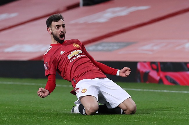 Manchester Uniteds Bruno Fernandes celebrates scoring his sides third goal of the game during the Emirates FA Cup fourth round match at Old Trafford, Manchester. Picture date: Sunday January 24, 2021. (Photo by Martin Rickett/PA Images via Getty Images)