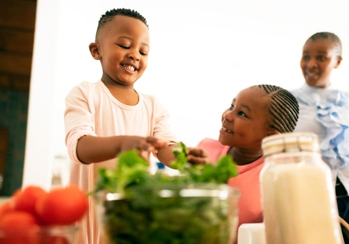 "When kids are involved in meal preparation, they become invested and are likely to eat the food". (PixelCatchers/Getty Images) 