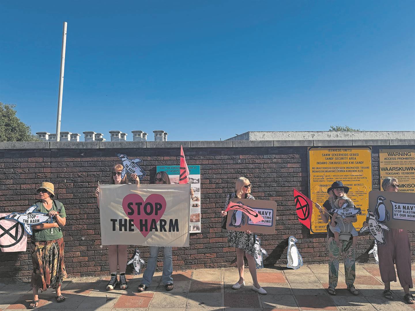 Residents and activists protested outside the SA Naval Base in Simon’s Town.PHOTOS: Supplied