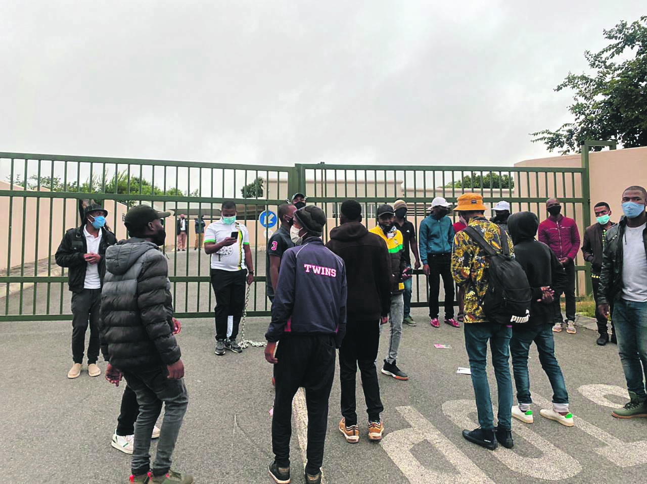 Cosas members protested outside Charterhouse yesterday after claims that the school was operating despite the lockdown regulations.
