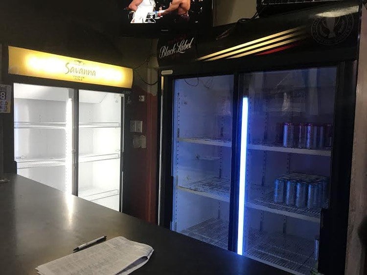 Empty fridges mark the alcohol ban at Yalta’s Pub and Grill in Parow. 