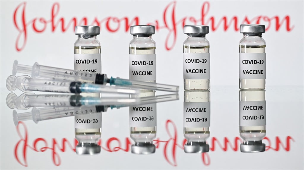 Vials of Covid-19 vaccine and syringes