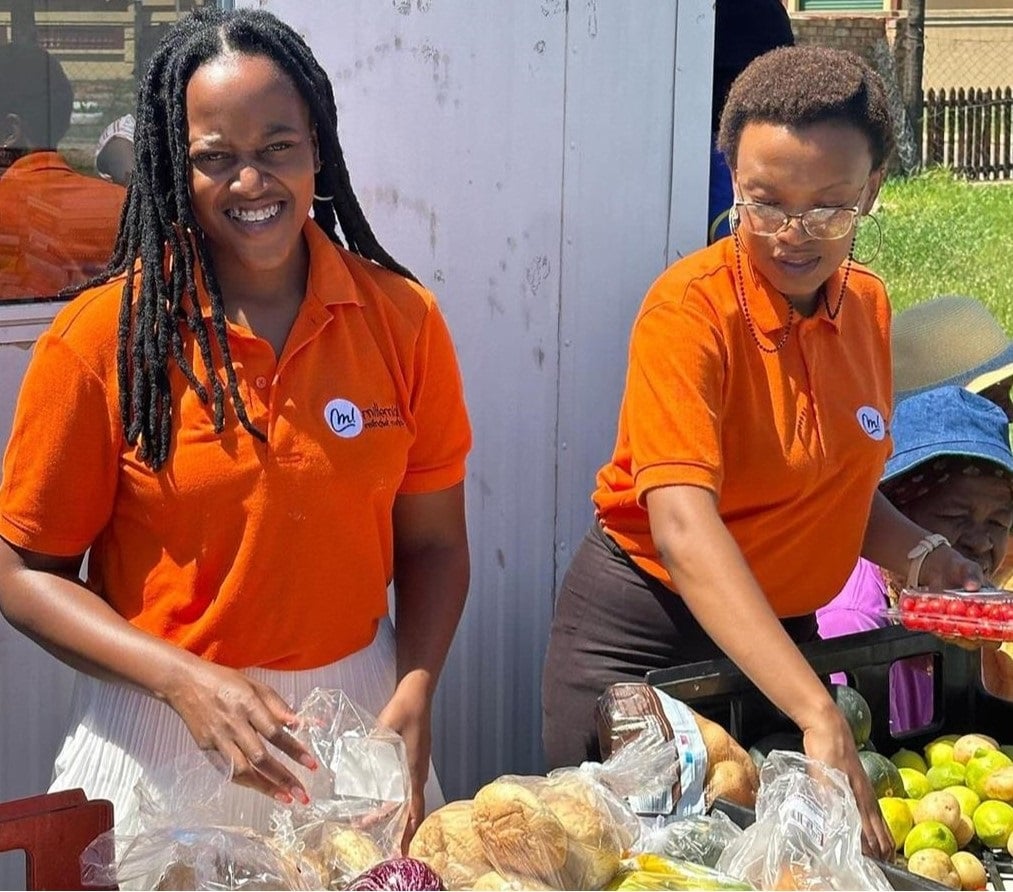 Marcia Monareng (right) is using the skills she acquired at university to give back to the community. (Supplied)