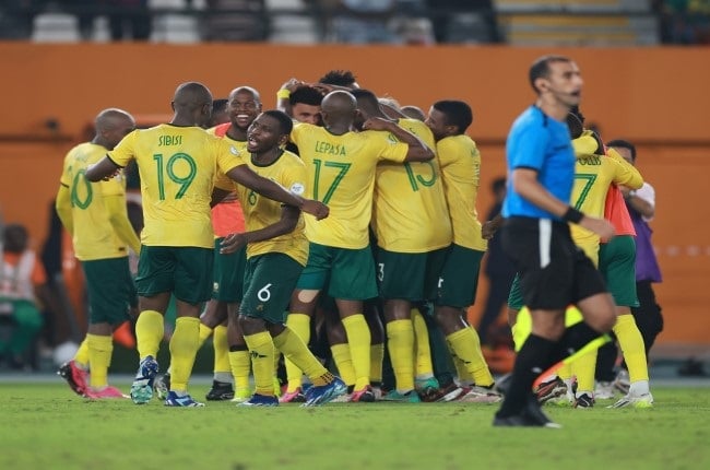 Bafana Bafana celebrate after winning the penalty shoot-out of the Africa Cup of Nations, third place play-off match against the Democratic Republic of Congo at Stade Felix Houphouet Boigny in Abidjan on Saturday. (Photo by Didier Lefa/Gallo Images)