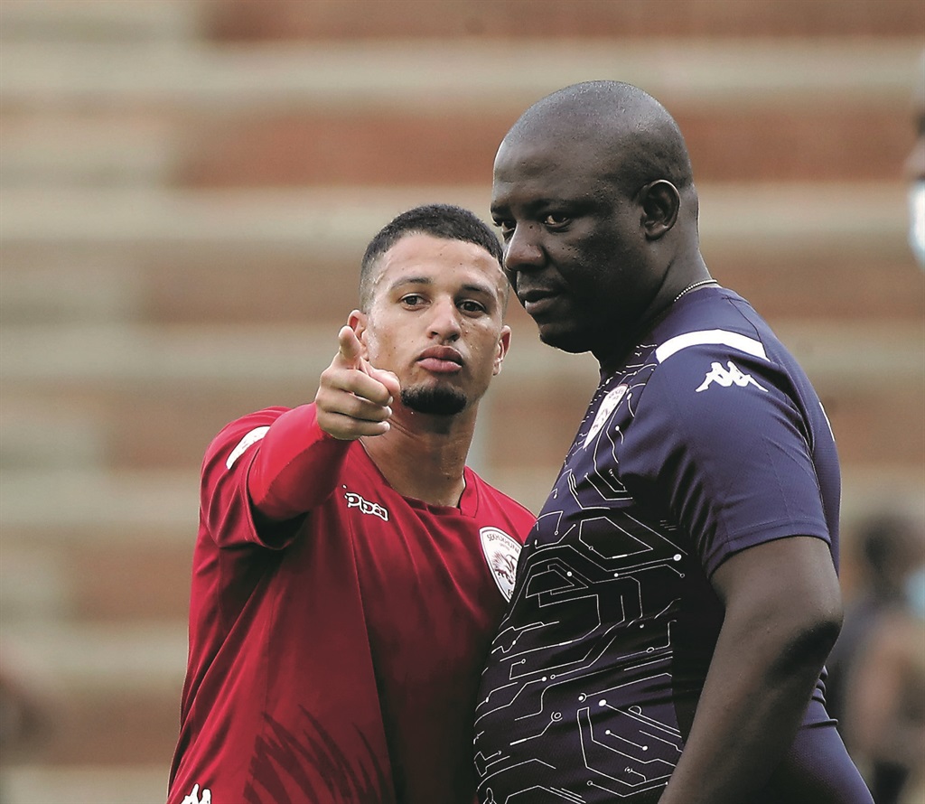 The Nedbank Cup holds special memories for Sekhukhune United coach MacDonald Makhubedu, seen here with his charge Yusuf Maart. Picture: Gavin Barker / BackpagePix