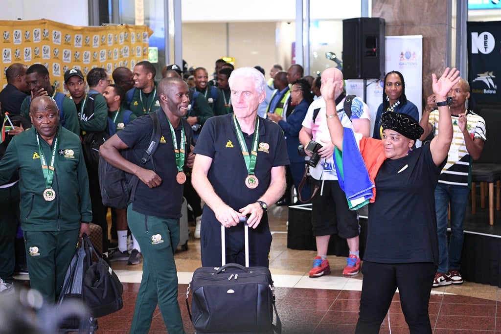JOHANNESBURG, SOUTH AFRICA - FEBRUARY 14: Bafana Bafana coach Hugo Broos during the South African national football team arrival at OR Tambo Airport on February 14, 2024 in Johannesburg, South Africa. (Photo by Lefty Shivambu/Gallo Images)