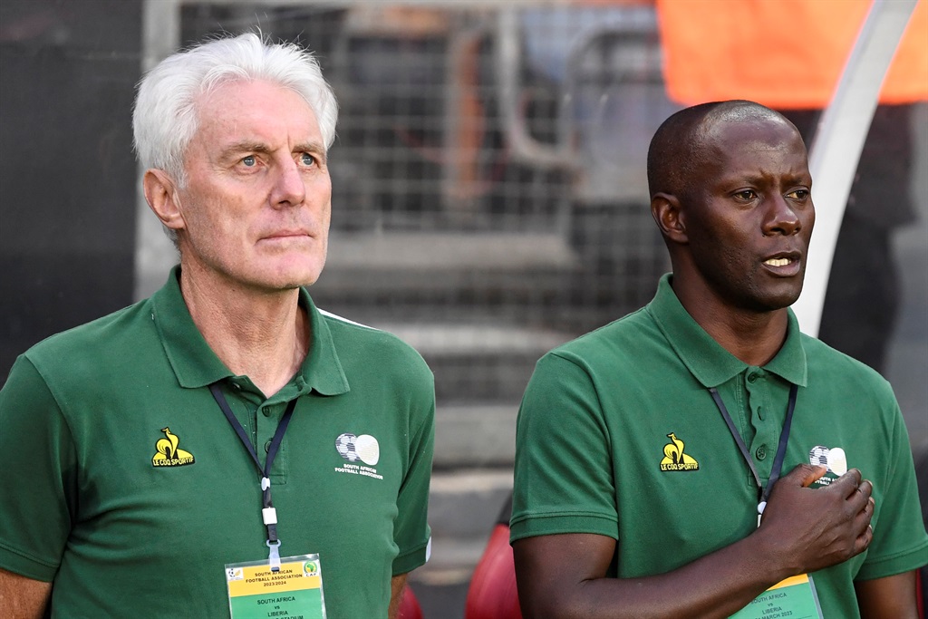 JOHANNESBURG, SOUTH AFRICA - MARCH 24: South Africa head coach Hugo Broos and Helman Mkhalele  during the 2023 Africa Cup of Nations qualifier match between South Africa and Liberia at Orlando Stadium on March 24, 2023 in Johannesburg, South Africa. (Photo by Lefty Shivambu/Gallo Images)