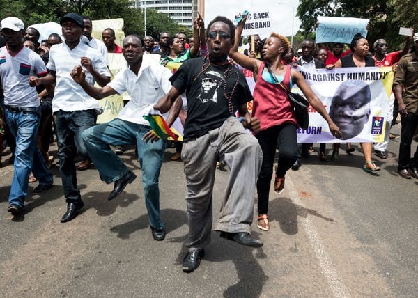 Zimbabwean protesters in Harare, demonstrating aga