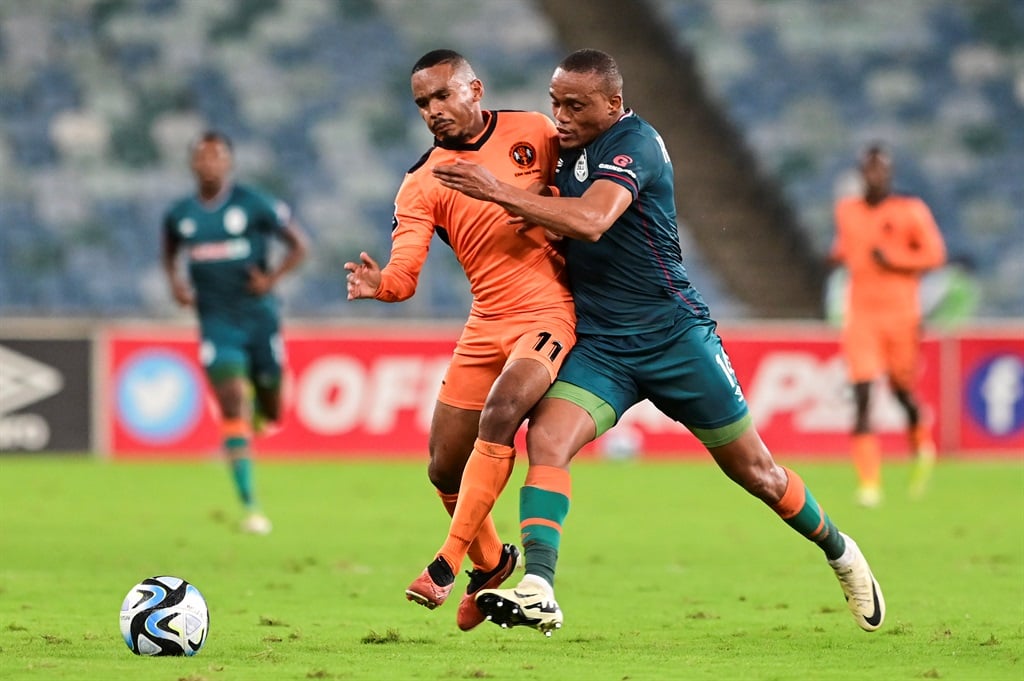 DURBAN, SOUTH AFRICA - APRIL 02: Oswin Appollis of Polokwane City FC and Riaan Hanamub of AmaZulu FC during the DStv Premiership match between AmaZulu FC and Polokwane City at Moses Mabhida Stadium on April 02, 2024 in Durban, South Africa. (Photo by Darren Stewart/Gallo Images)