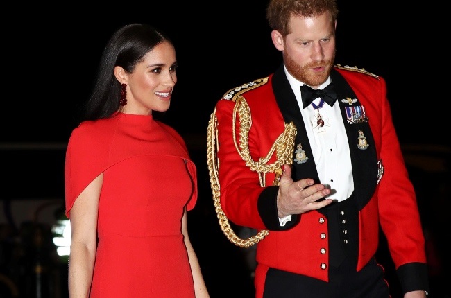 Prince Harry – seen here at a show celebrating military bands at the Royal Albert Hall last year with wife Meghan Markle – has vowed to fight to keep his honourary military roles in the UK. (Photo: Gallo Images/Getty Images)