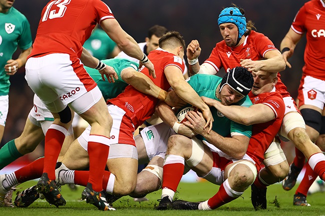 James Ryan of Ireland is held up by Jac Morgan of Wales during the Six Nations match in Cardiff on 4 February 2023. (Photo by Michael Steele/Getty Images)